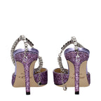 Jimmy Choo purple plastic stiletto heel sandals with open toe and ankle strap, stylish footwear for elegant occasions.