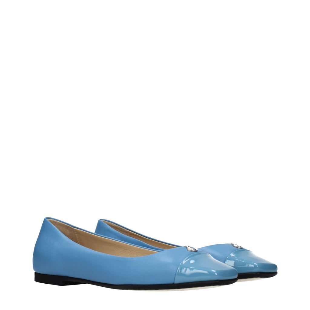 Light blue leather ballet flats by Jimmy Choo, featuring a sleek design and rounded toe, perfect for elegant casual wear.