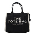 Black fabric shoulder bag by Marc Jacobs with adjustable strap and minimalist design, perfect for everyday wear.