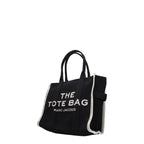 Black fabric shoulder bag by Marc Jacobs with sleek design and adjustable strap, stylish accessory for everyday wear.