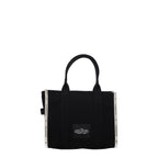 Black fabric shoulder bag by Marc Jacobs featuring a sleek design and adjustable strap.