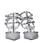 Gray leather Valentino Garavani stiletto heel sandals with ankle straps and open toe design.