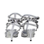 Valentino Garavani gray leather stiletto heel sandals with ankle straps and open toe design.