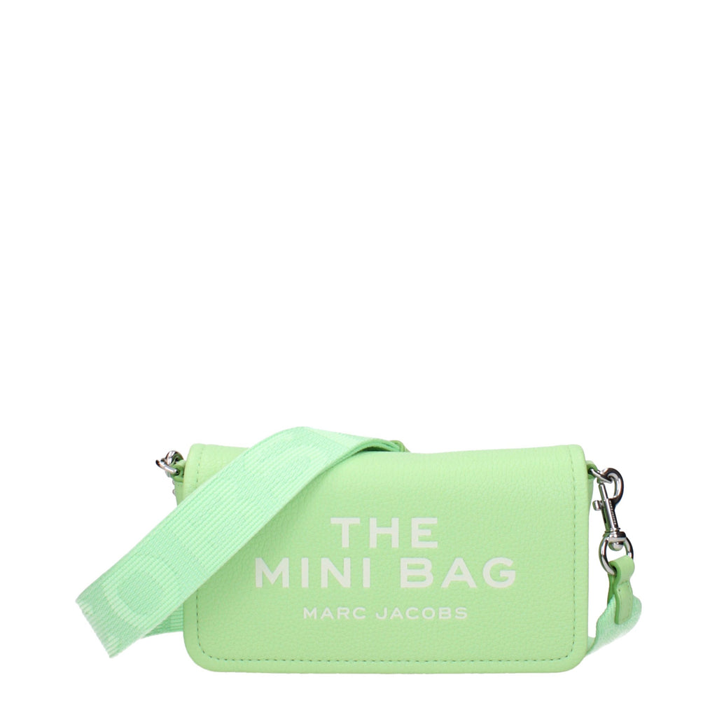 Marc Jacobs green leather crossbody bag with adjustable strap and gold-tone hardware, showcasing a sleek, stylish design.