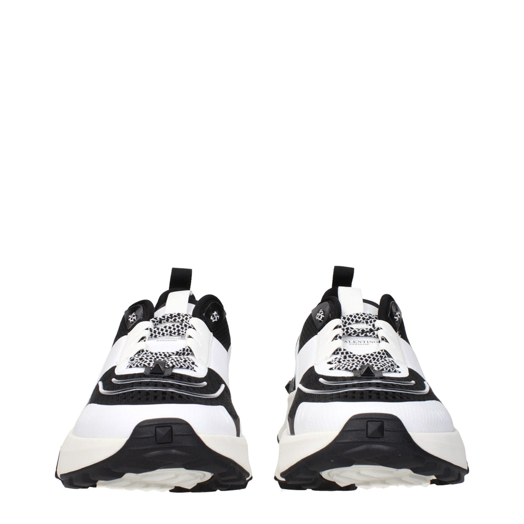 Valentino Garavani black fabric athletic sneakers with sleek design and lace-up closure, ideal for casual and sporty wear.