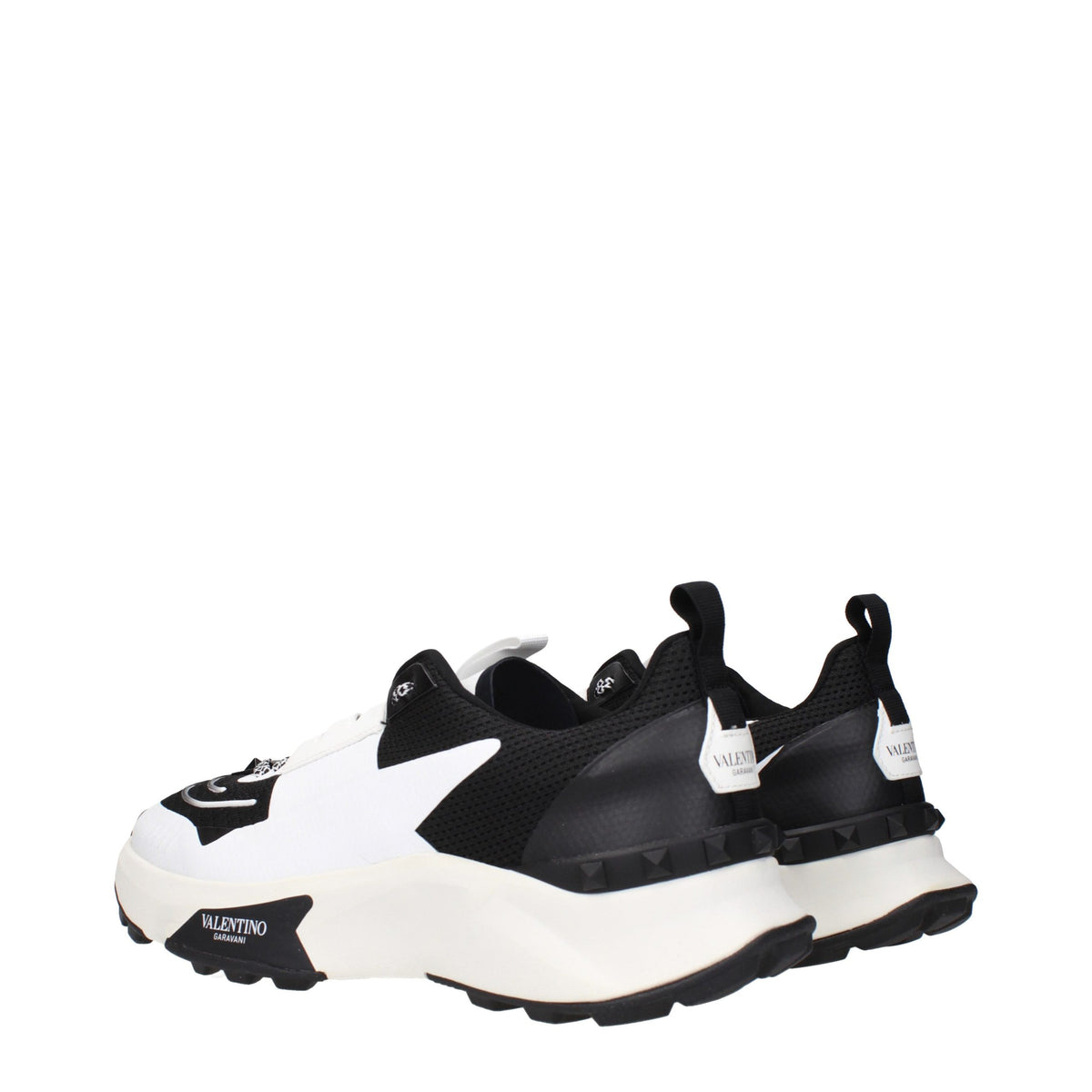 Valentino Garavani black fabric athletic sneakers with sleek design and white sole, ideal for casual and active wear.