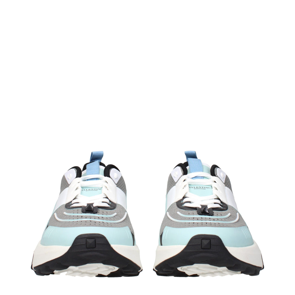 Gray Valentino Garavani fabric athletic sneakers with white soles and sporty design.