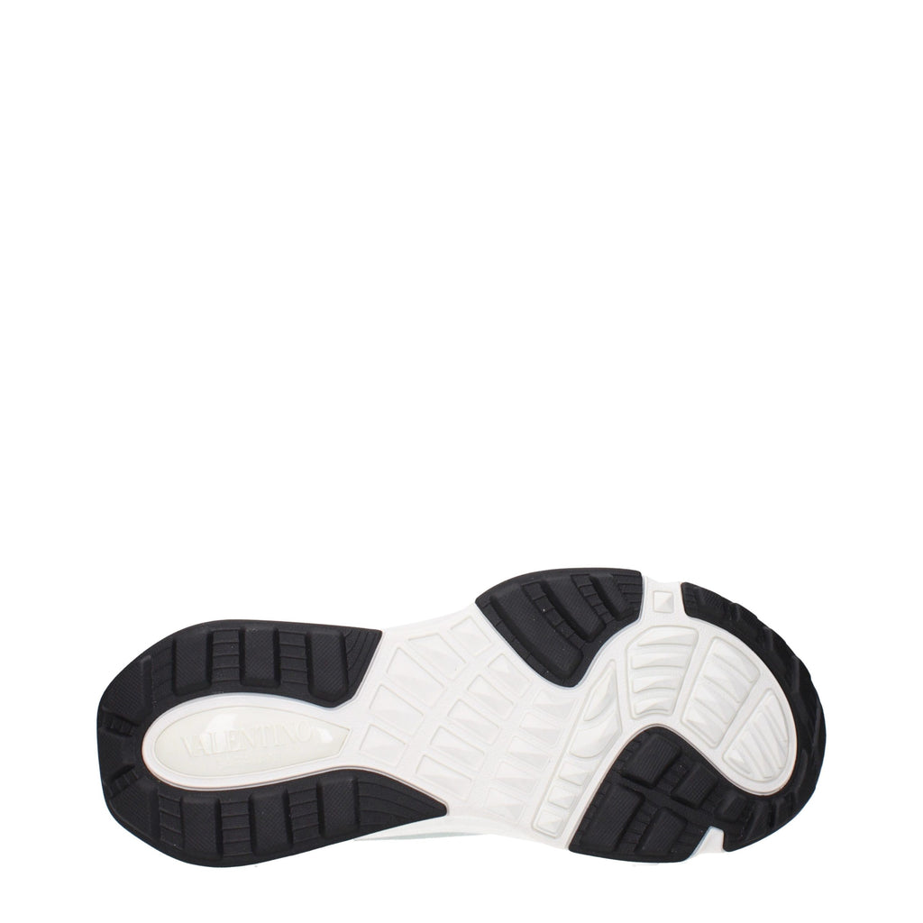 Valentino Garavani gray fabric athletic sneakers with white soles and stylish design for casual or athletic wear.