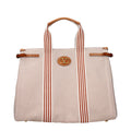 Beige Valentino Garavani fabric handbag with structured design and top handles, featuring subtle branding details.