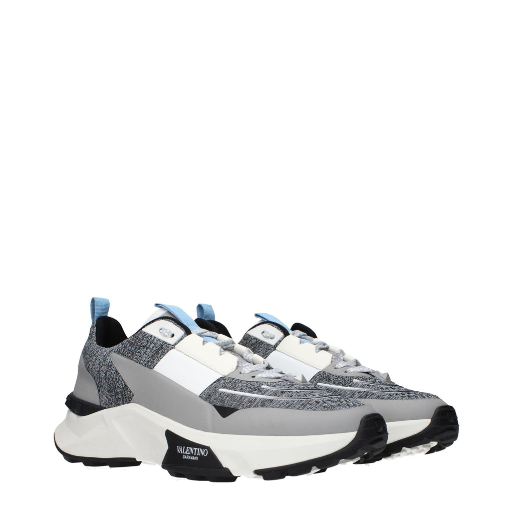 Gray Valentino Garavani fabric athletic sneakers with white soles and subtle branding, designed for casual and active wear.