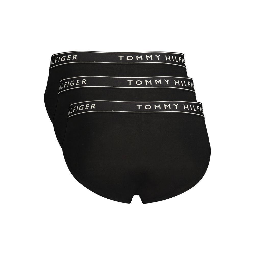 Black cotton men's briefs by Tommy Hilfiger featuring the iconic logo waistband and comfortable fit.