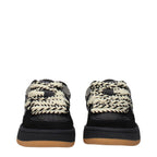 Black leather low top sneakers by Barrow, featuring sleek design and casual style, perfect for everyday wear.