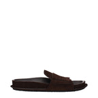 Jacquemus brown leather slippers with a sleek design, featuring soft leather straps and a comfortable flat sole.