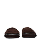 Jacquemus brown leather slippers with open-toe design and slip-on style, perfect for casual or stylish summer wear.