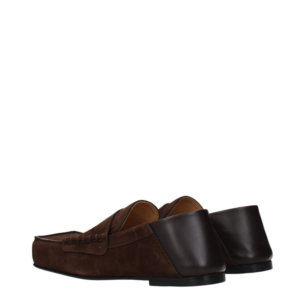 Jacquemus brown leather slip-on loafers with sleek design and rounded toes, perfect for casual or smart attire.