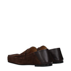 Jacquemus brown leather slip-on loafers with sleek design and rounded toes, perfect for casual or smart attire.
