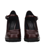 Max Mara brown leather high heel pumps with pointed toes and sleek design, perfect for elegant footwear.
