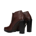Max Mara brown leather ankle boots with sleek design and low heel, perfect for stylish everyday wear.