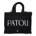 Patou black cotton handbag with sleek design, featuring sturdy handles and minimalist style for versatile everyday use.
