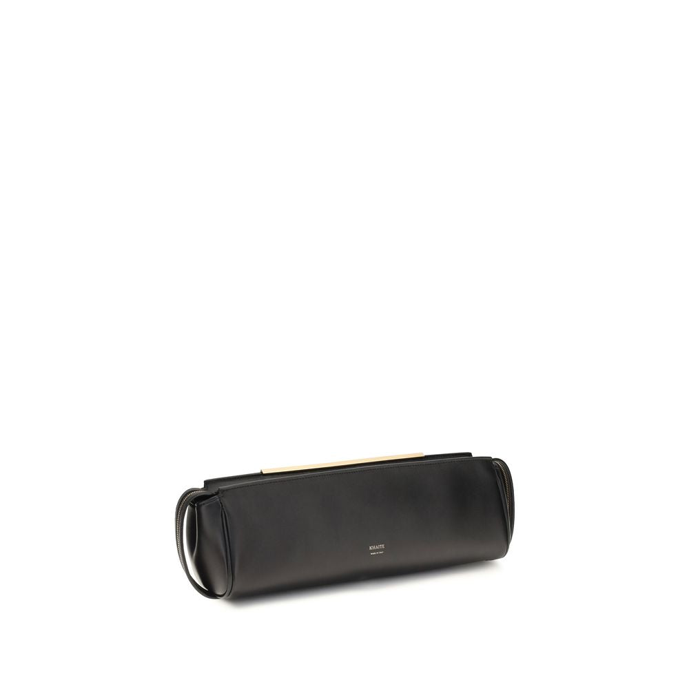 Khaite black calf leather Bos Taurus clutch bag with sleek design and minimalist style, featuring a smooth surface and compact shape.