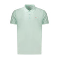Green cotton men's polo shirt by Fila with a classic collar and short sleeves, displayed on a plain background.
