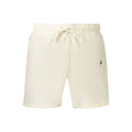 Beige polyester men's shorts by Tommy Hilfiger with a relaxed fit and adjustable waistband, shown on a model.