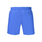 Tommy Hilfiger men's blue polyester shorts with elastic waistband and side pockets, casual summer apparel.