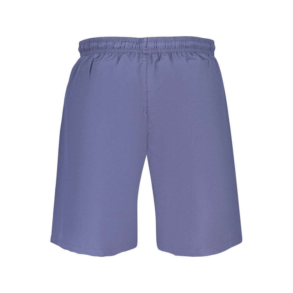 Fila blue polyester men's swimwear shorts with an elastic waistband and sporty design, ideal for beach or pool swimming.