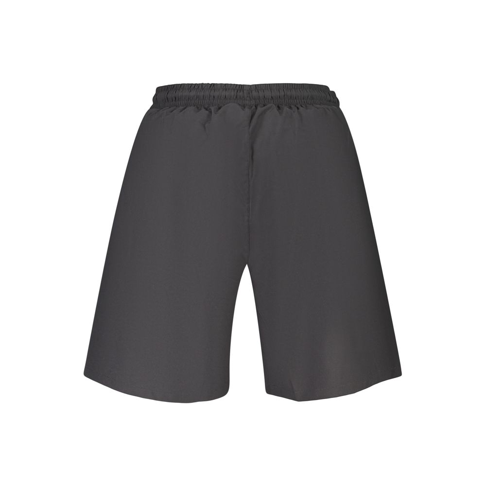 Black Fila men's swimwear made of polyester, featuring a sleek design suitable for swimming and beachwear.