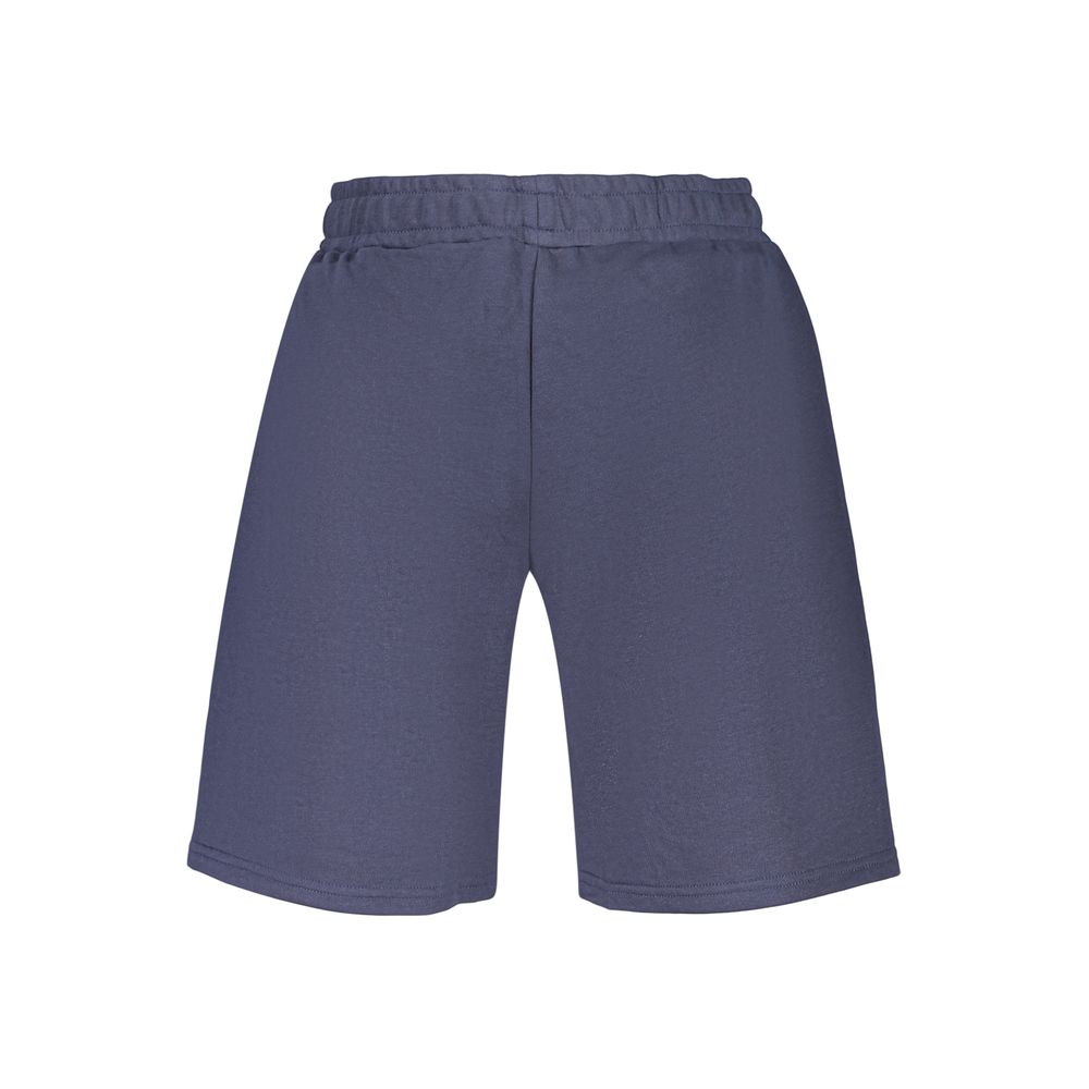 Fila blue cotton men's pants shown on a model, featuring a relaxed fit and casual style suitable for everyday wear.