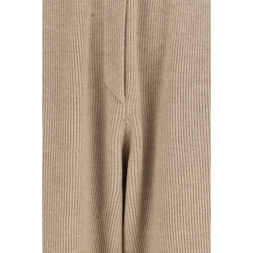 Beige Brunello Cucinelli cashmere casual pants laid flat, showcasing soft fabric and relaxed fit for comfortable everyday wear.