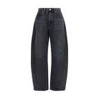 Black cotton denim jeans by Alexander Wang, showcasing a slim fit with classic five-pocket design and subtle branding details.