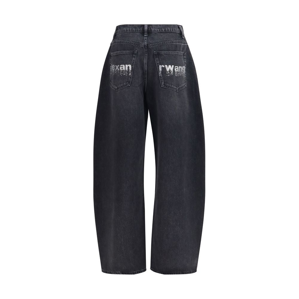 Alexander Wang black cotton denim jeans displayed flat, showing classic five-pocket design and sleek, modern fit.