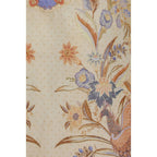 Zimmermann multicolor linen casual dress displayed on a hanger, featuring a relaxed fit and vibrant pattern.