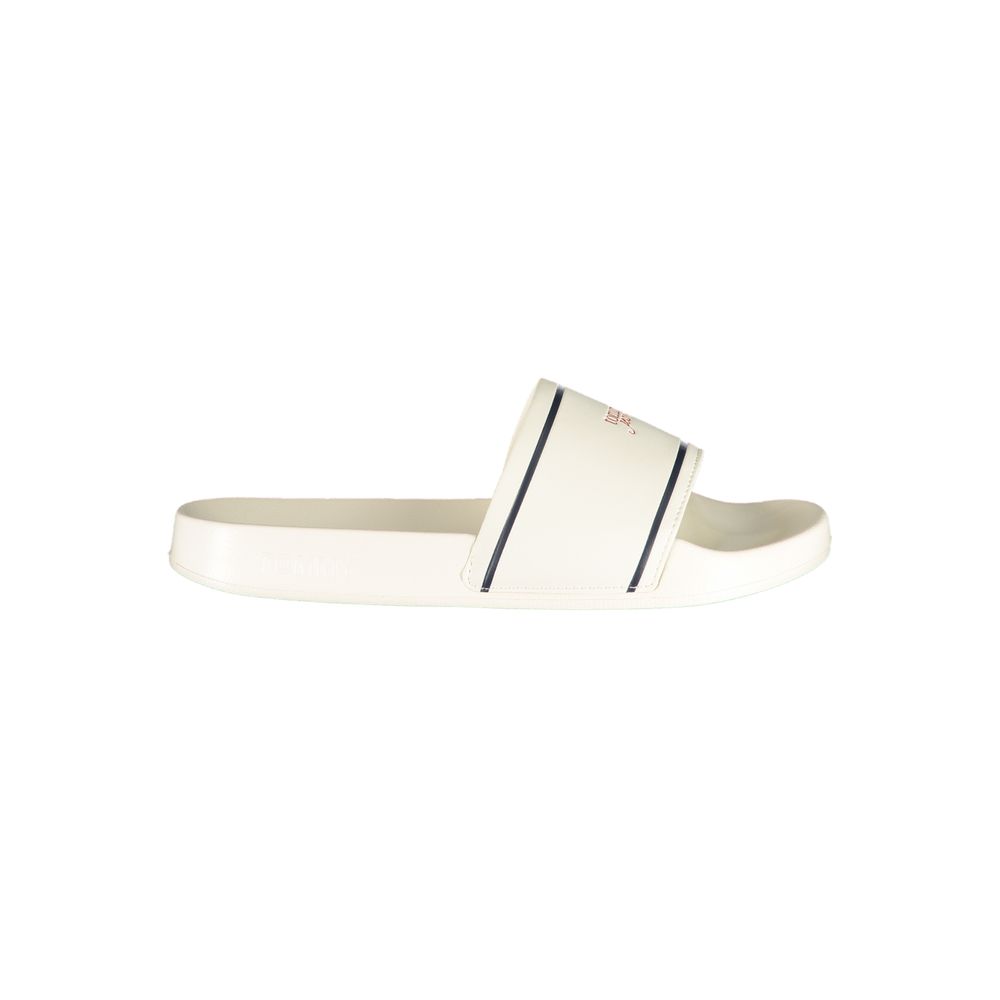 Tommy Hilfiger white polyurethane women's slipper with open toe and slip-on design, casual footwear for everyday comfort.