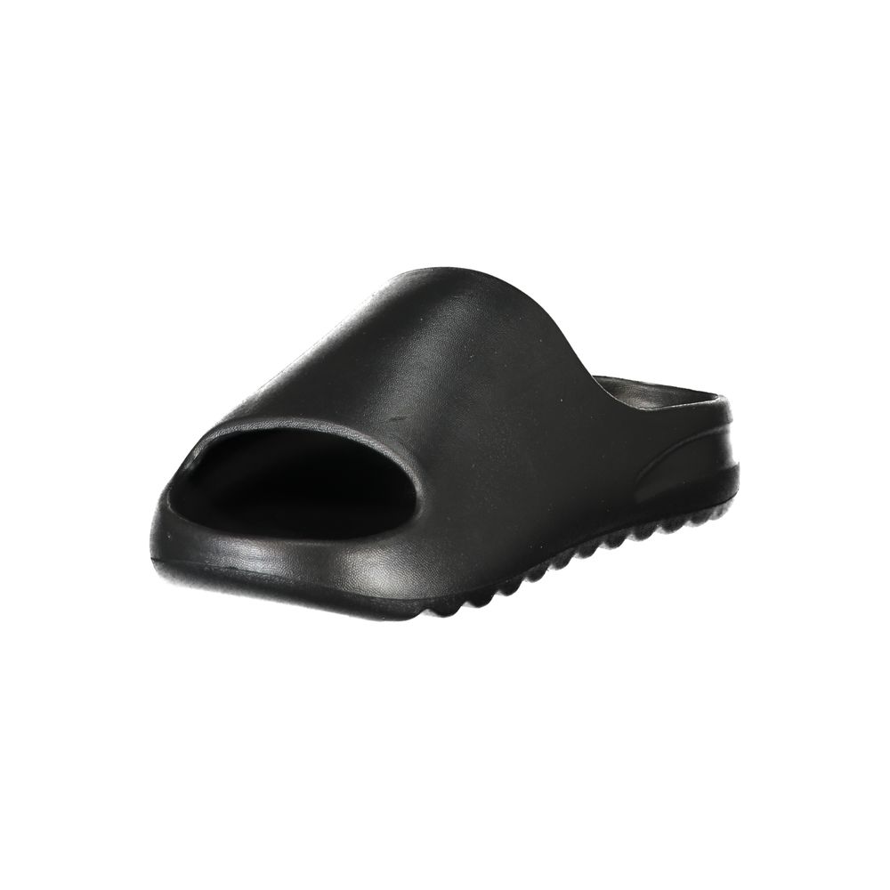 Norway 1963 black polyurethane women's slippers with open toe design and slip-on style, ideal for casual indoor wear.