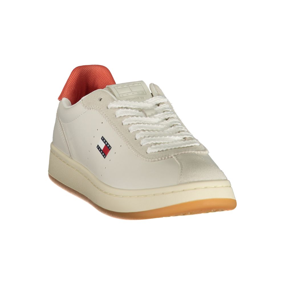 Tommy Hilfiger beige women's sneaker with polyurethane upper, stylish casual shoe with white sole and laces.