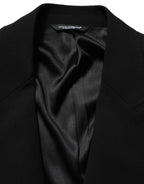 Dolce & Gabbana black wool single-breasted men's blazer jacket, tailored fit with notch lapel and button closure.