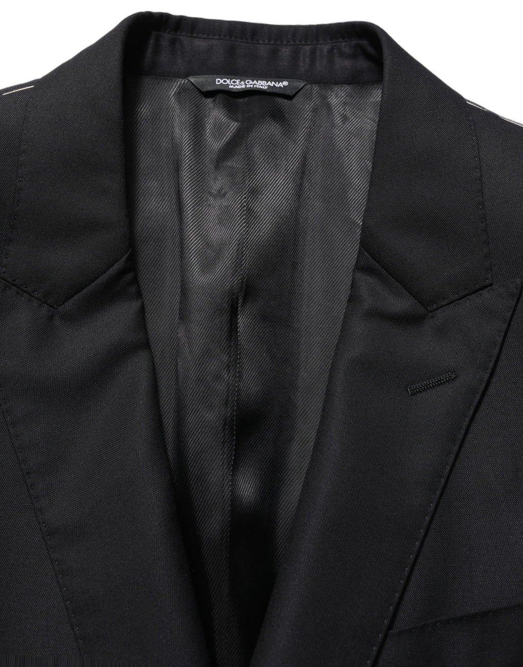 Dark blue wool Dolce & Gabbana men's single-breasted blazer jacket with notch lapel and buttons, tailored fit for a refined look.