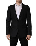 Dark blue wool Dolce & Gabbana men's single-breasted blazer jacket with notch lapels and tailored fit.