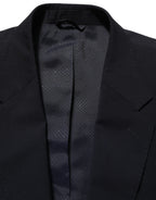 Dark blue wool men's blazer jacket by Dolce & Gabbana, single-breasted design with structured fit and classic lapel.