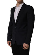 Dark blue wool men's blazer jacket by Dolce & Gabbana, single-breasted style with notch lapels and tailored fit.