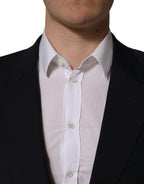Dark blue wool men's blazer jacket by Dolce & Gabbana, single-breasted design with notch lapel and tailored fit.