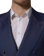 Blue wool Dolce & Gabbana men's double-breasted blazer jacket with structured fit and classic lapel, displayed on a hanger.
