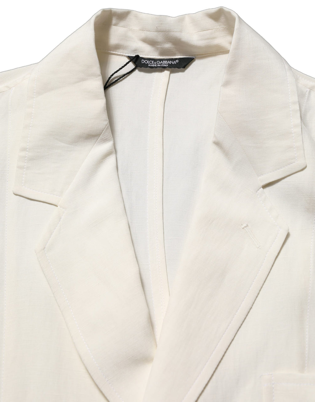 Dolce & Gabbana off-white flax single-breasted blazer jacket with notch lapels and tailored fit, displayed on a hanger.