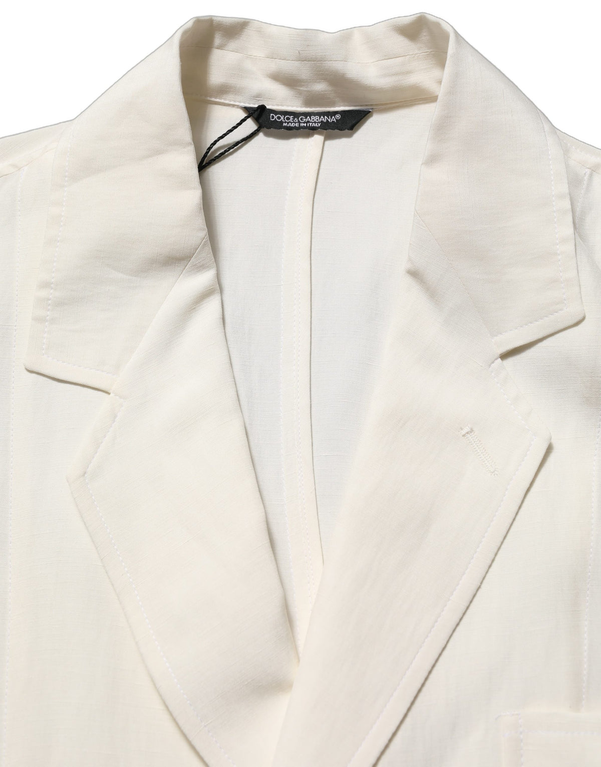 Dolce & Gabbana off-white flax single-breasted blazer jacket with notch lapels and tailored fit, displayed on a hanger.