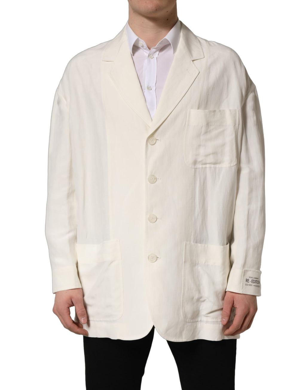 Dolce & Gabbana off-white flax single-breasted blazer jacket displayed on a hanger, showcasing tailored fit and classic lapel design.
