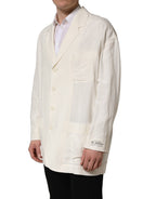 Dolce & Gabbana off-white flax single-breasted blazer jacket with tailored fit and classic lapel design.