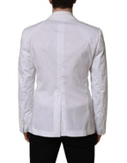 Dolce & Gabbana white cotton double-breasted blazer jacket displayed on a hanger, showcasing classic tailored style.