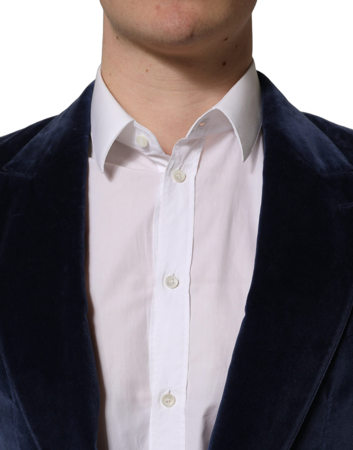 Dolce & Gabbana blue velvet single-breasted blazer jacket with notch lapel and tailored fit, shown on a hanger.